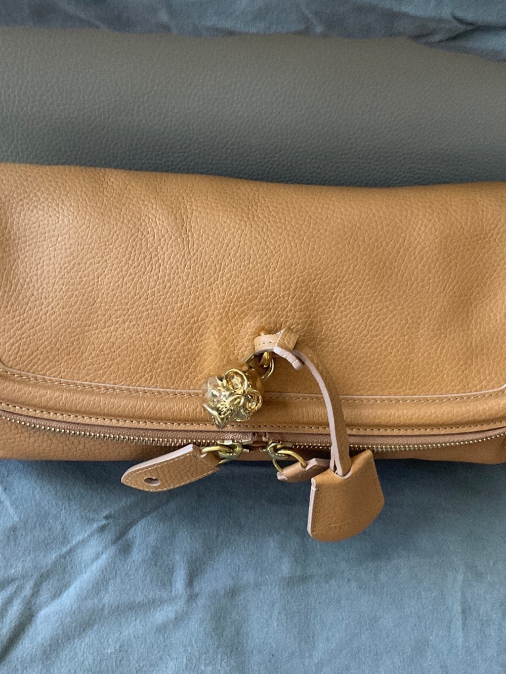 Alexander McQueen Tan Clutch with skulls and padlock
